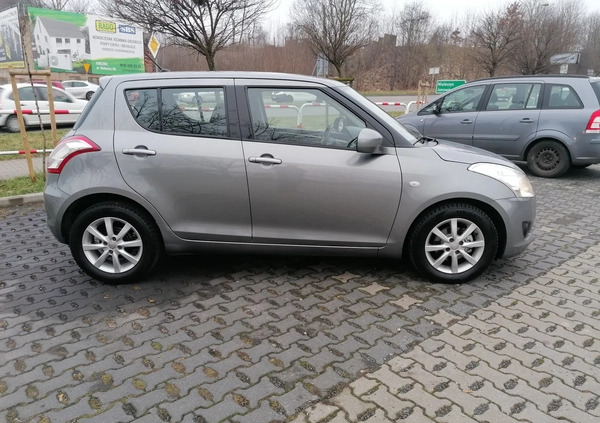 Suzuki Swift cena 19990 przebieg: 176000, rok produkcji 2012 z Gniezno małe 254
